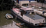 Bewohntes Boot auf der Themse  - London